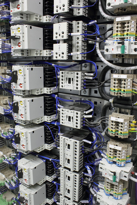 Electrical equipment with miniature circuit breakers, terminals and relays.